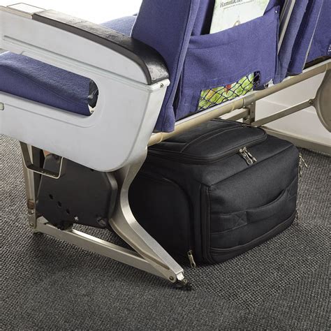 rolling backpack under airplane seat.